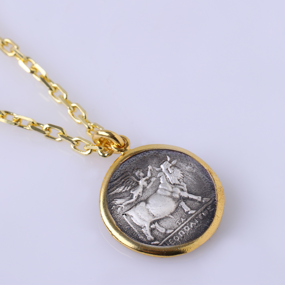 The Campania Neapolis Coin Pendant-A hand-sculpted 22K Gold Vermeil cast. Get this designer jewellery piece at only at The Luxe Maison. Shop now!