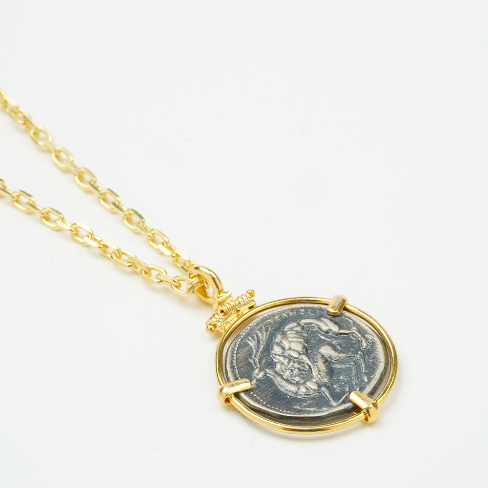 22K Gold Vermeil pendant with antique Greek coin imitation (300-280 BC). Explore antique jewellery online from our exclusive collection. Shop now!