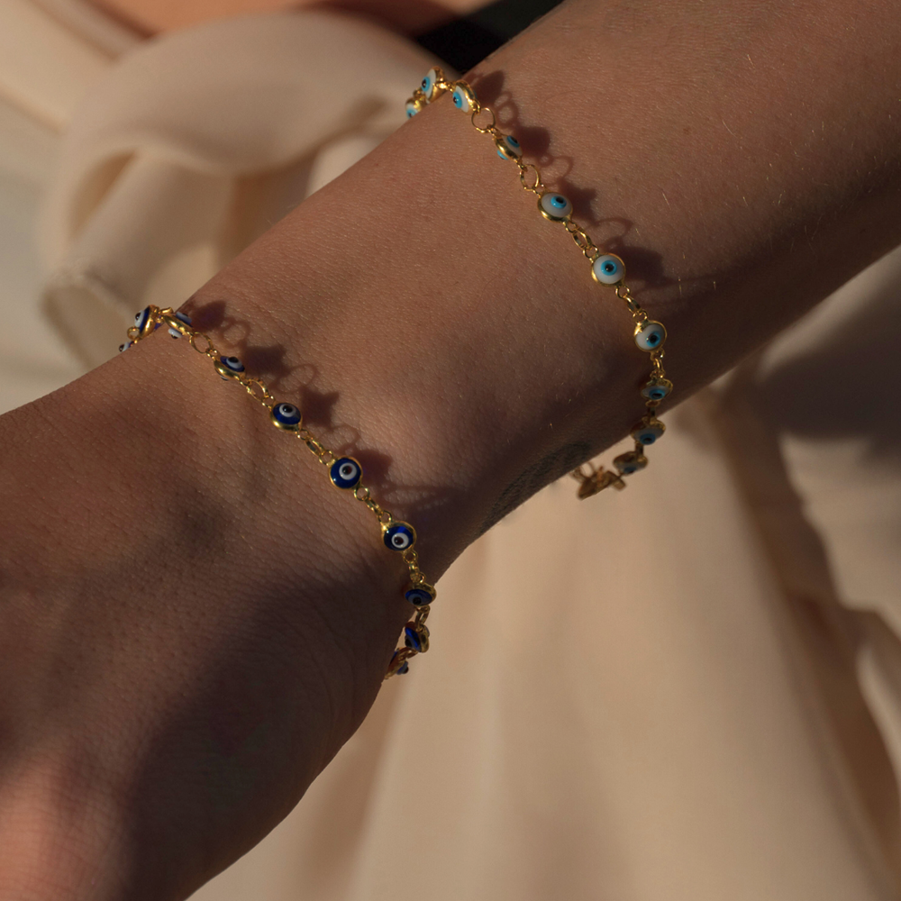 Nazar Bracelet in 22K Gold Vermeil is designed to create the perfect talisman with handcrafted glass charms. Shop designer charm bracelets. Shop now!