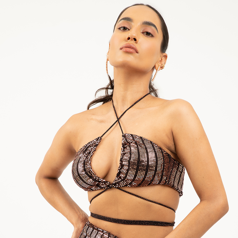 Discover the Top Wendy in stunning bronze, a luxurious addition to your wardrobe. Elevate your style with this elegant and versatile piece. Shop Now!