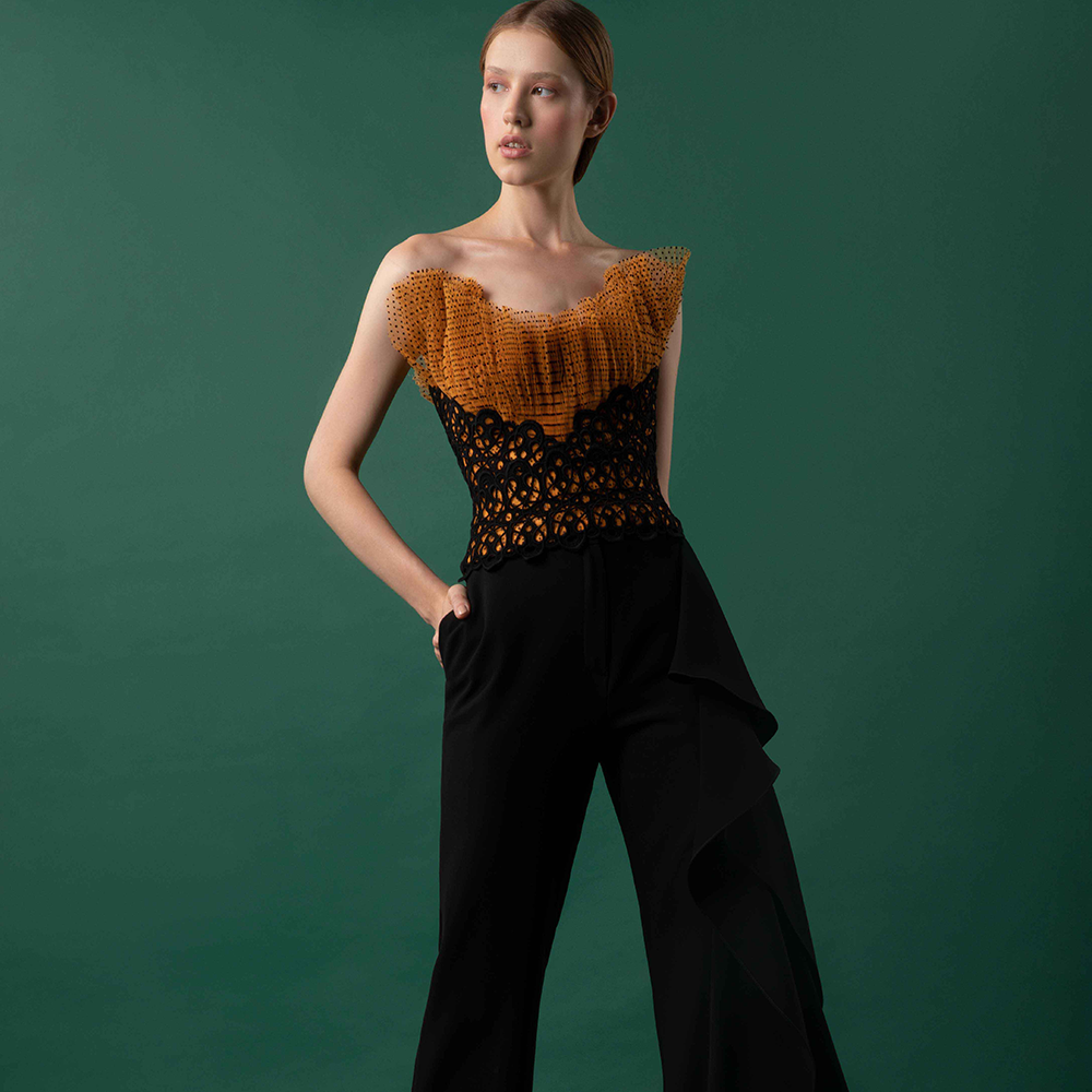 Fully beaded top with crepe sailor collar and wide leg crepe pants.