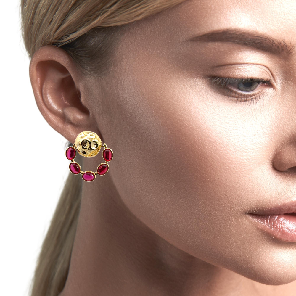 Elegant 22K yellow gold plated drop earrings with hammered detailing and vibrant created ruby accents. A timeless statement piece for every occasion. Shop premium jewelry online.