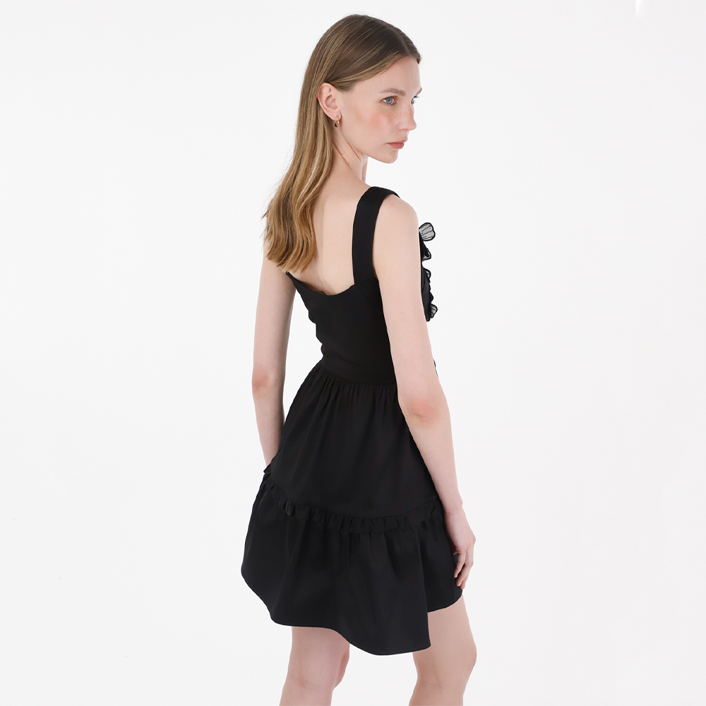 Discover the blend of elegance and natural essence in our Mini Trocadero Dress. 