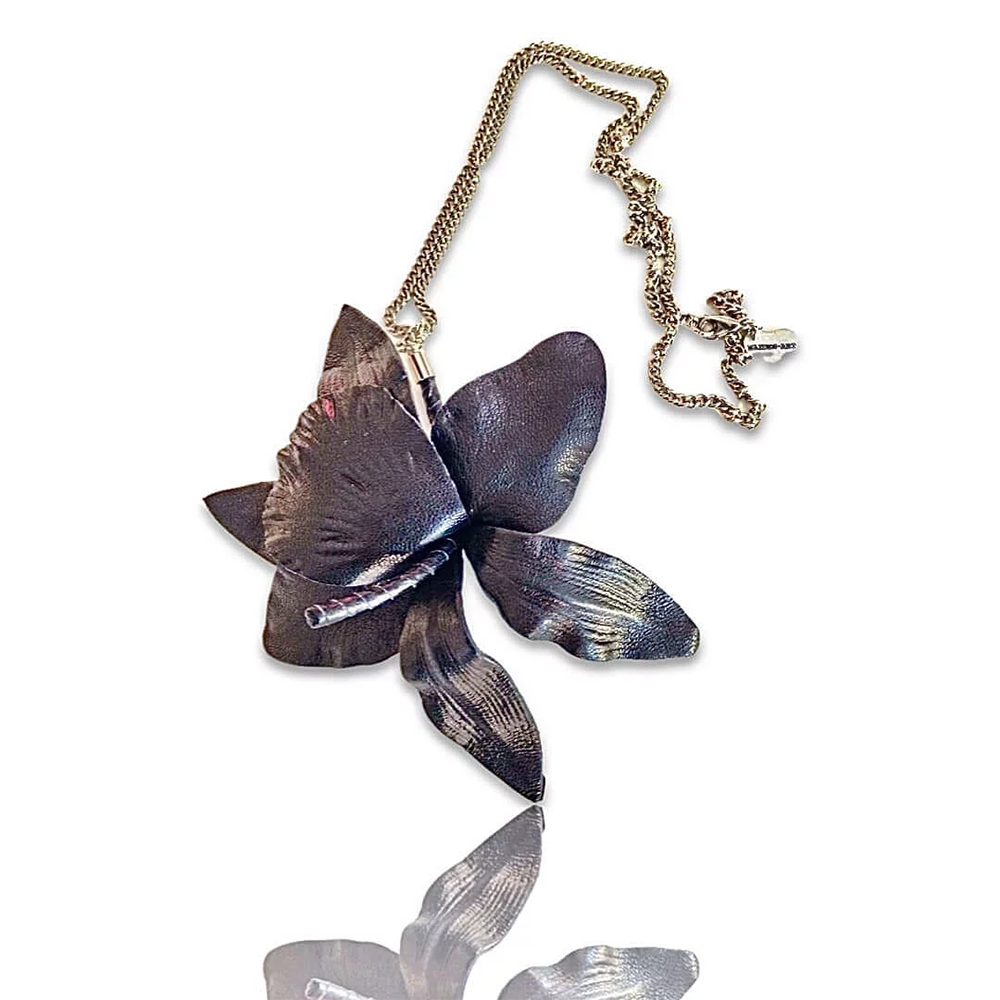 Fantastic soft true leather orchid brooch, to give a touch of glamour to your outfit.