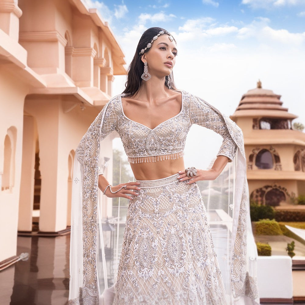 Intricate hand embroidered 3 pcs lehenga ensemble baroque kat dana and crystal work with train.