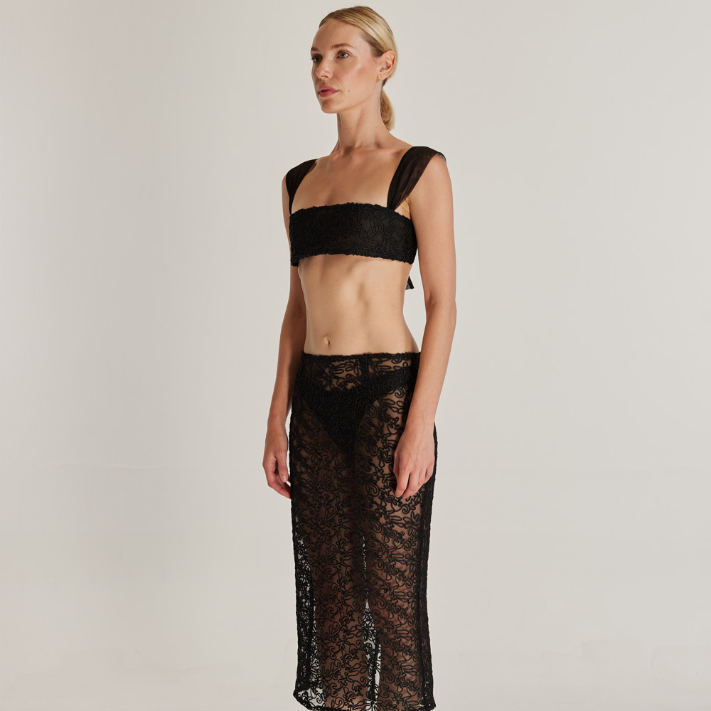 Introducing Tumbleweed, a harmonious set featuring intricate black embroidery on sheer black tulle.