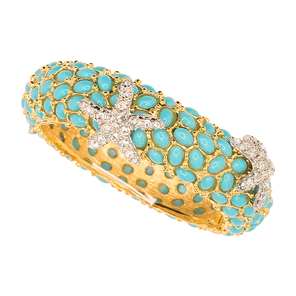 Channel the sea with this crystal pave and turquoise starfish bangle. 