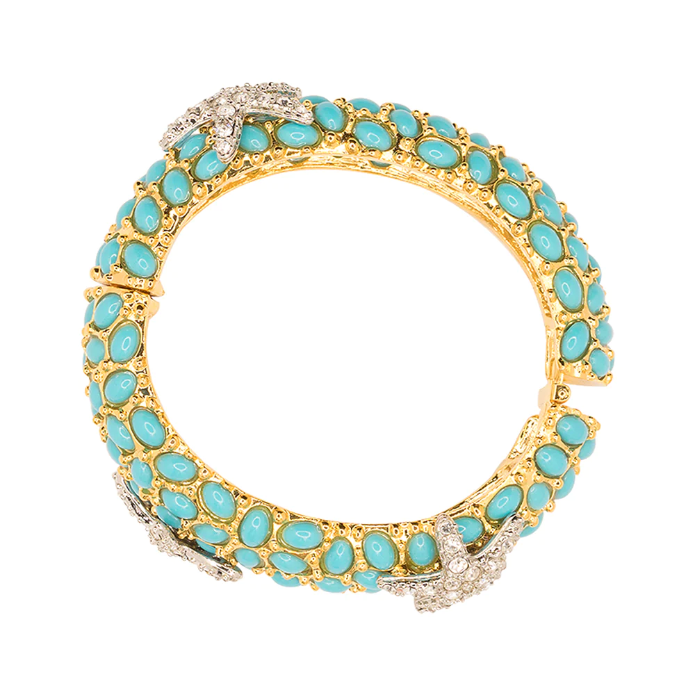 Channel the sea with this crystal pave and turquoise starfish bangle. 