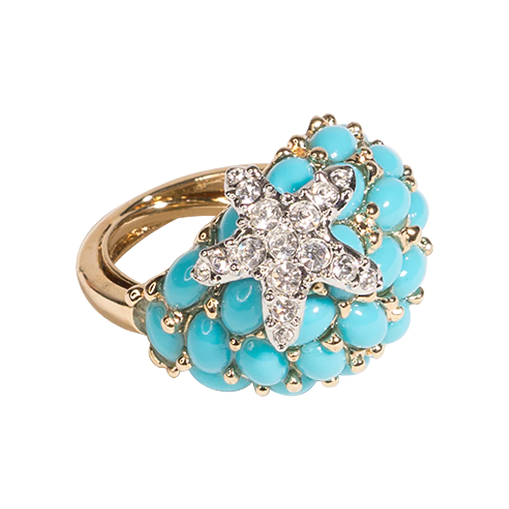 Channel the sea with this turquoise ring with a crystal starfish. 3/4" wide. 1/2" high" long.