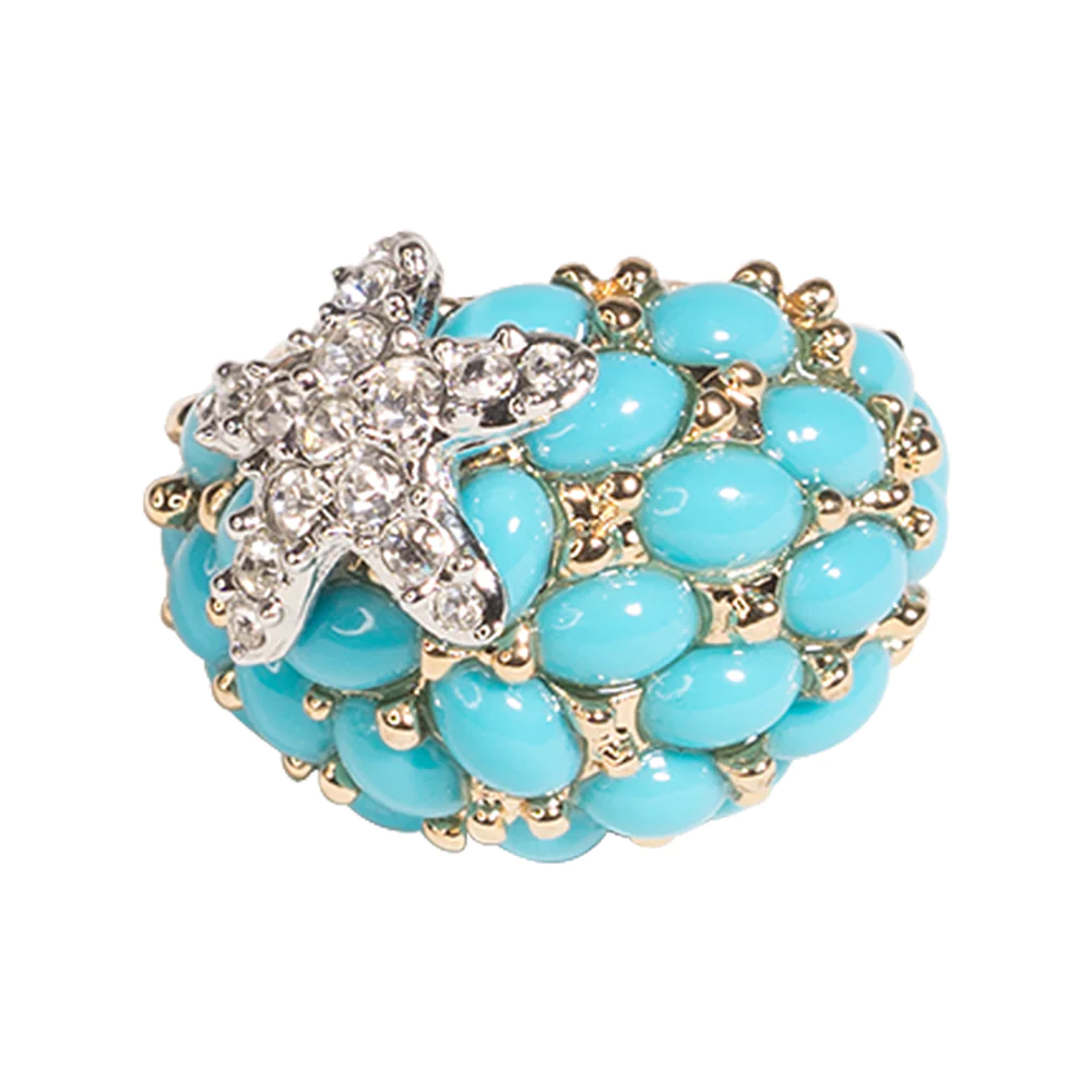 Channel the sea with this turquoise ring with a crystal starfish. 3/4" wide. 1/2" high" long.