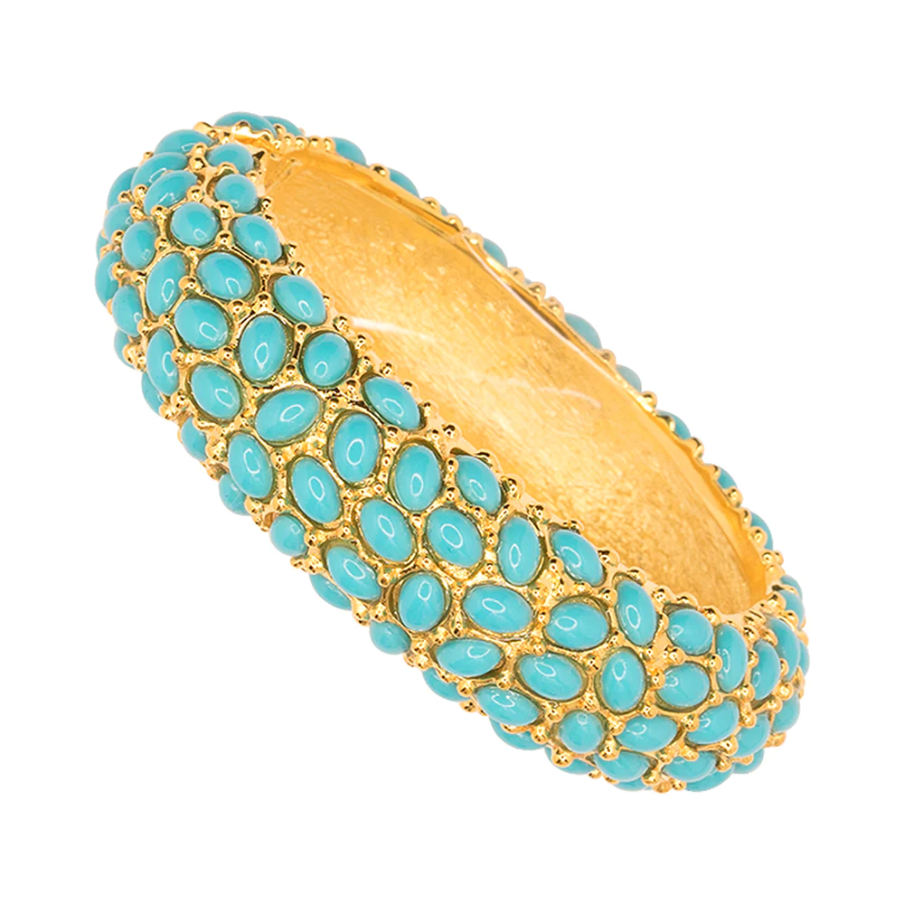 Make a bold and bright statement with this gold plated turquoise cabochon bangle.