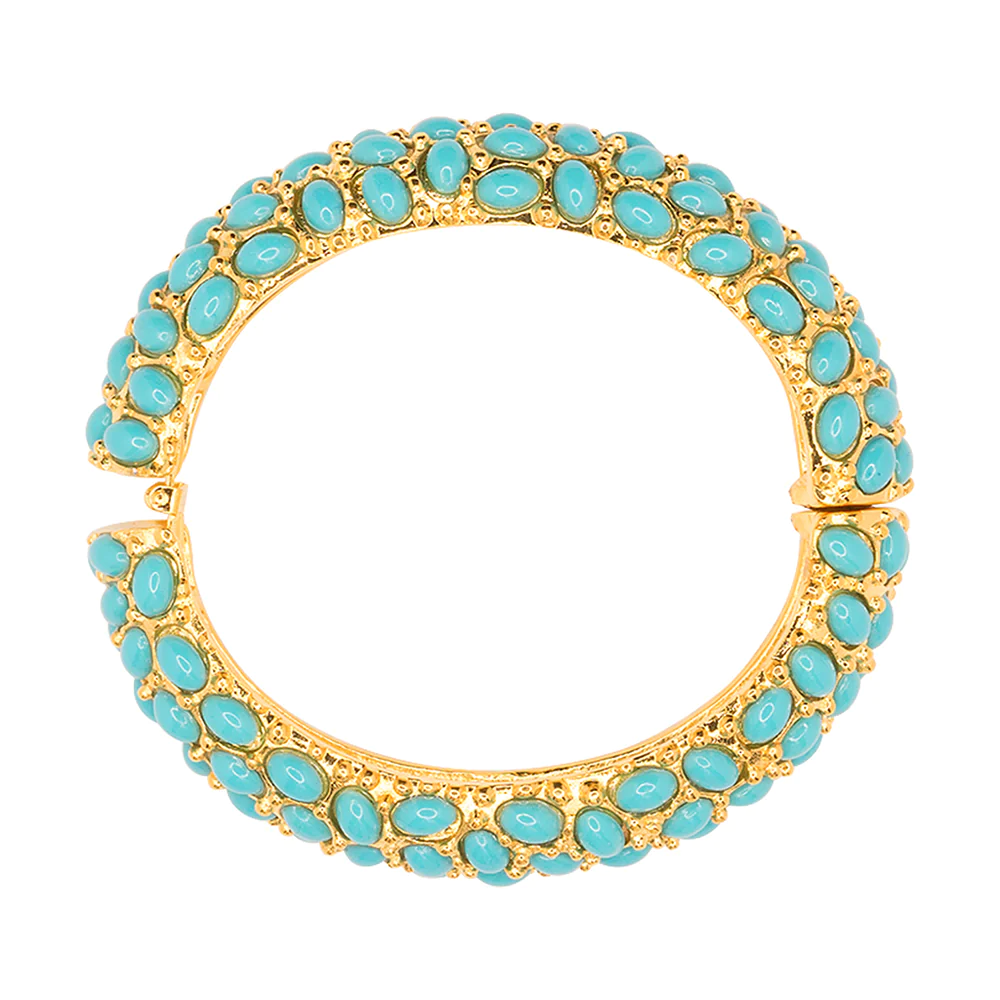 Make a bold and bright statement with this gold plated turquoise cabochon bangle.