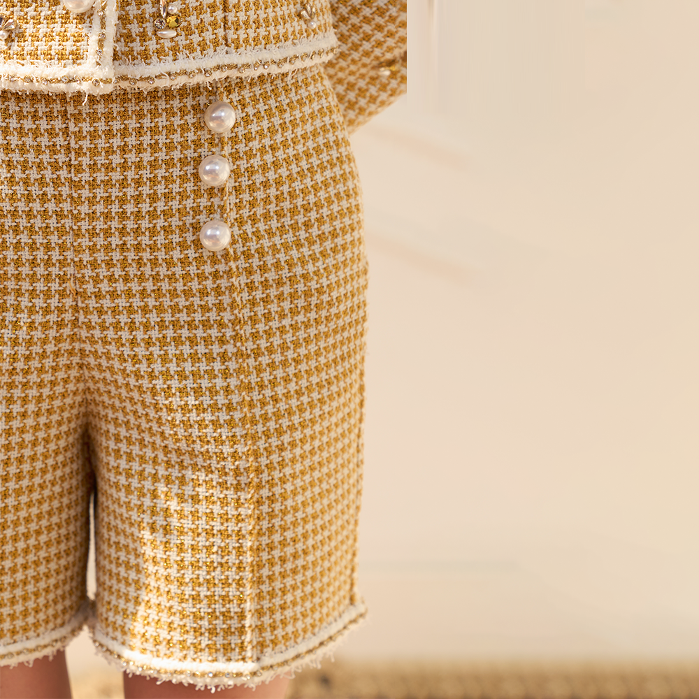 Get your hands on The Luxe Maison Tweed Short With Pearl Buttons at the best cloth shop online. Luxe, stylish, and unique. Shop Now!