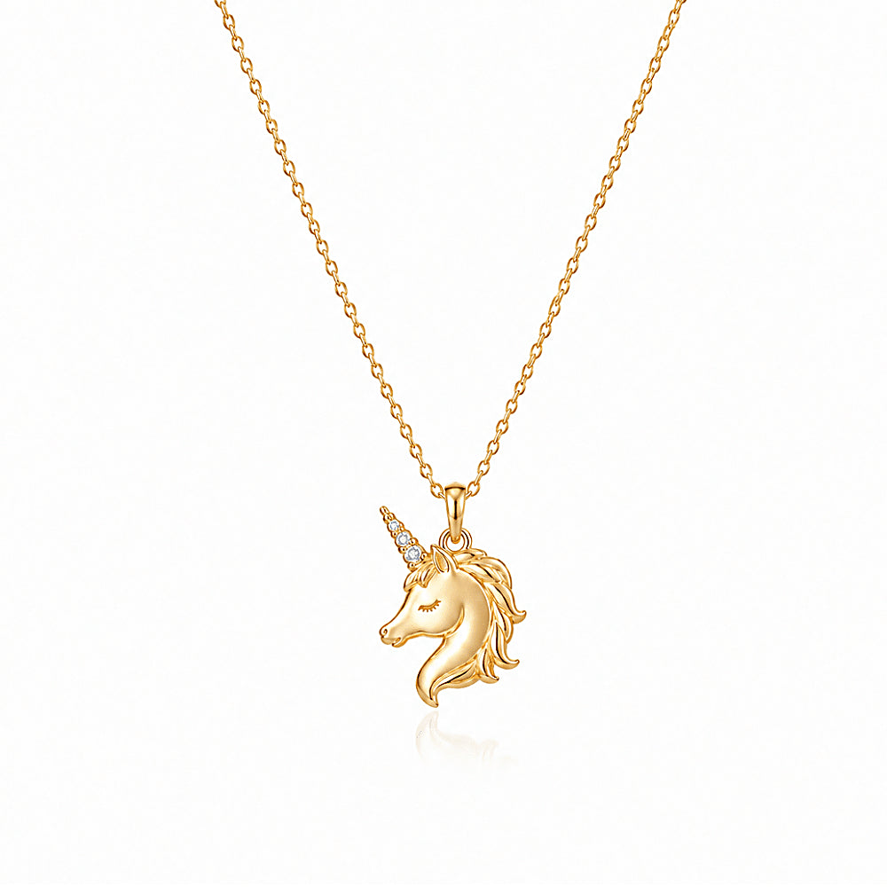 Discover the Unicorn Necklace in 14K Solid Gold and Diamonds at The Luxe Maison, featuring a gracefully sculpted unicorn in solid 14K gold with a flowing mane and a brilliant natural diamond-set horn. Symbolizing hope, purity, and limitless possibility, this handcrafted necklace is a modern heirloom celebrating imagination and the courage to believe in the extraordinary. Made to order, please allow 3–4 weeks for creation before shipping.