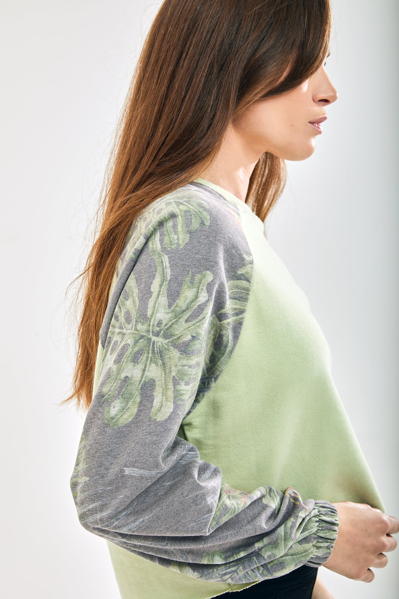 Women's Printed Raglan Sleeve Crop Sweat - Long sleeves, elasticated cuffs, regular fit, available in UK sizes 8-12.