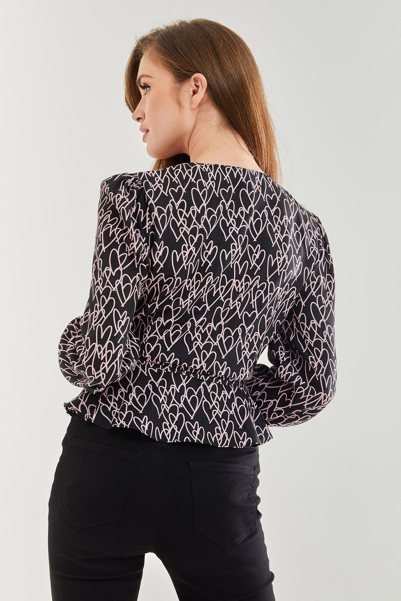 Women's Heart Print Wrap Top in Black with V Neck, Long Sleeves, Tie Waist, and Skinny Fit