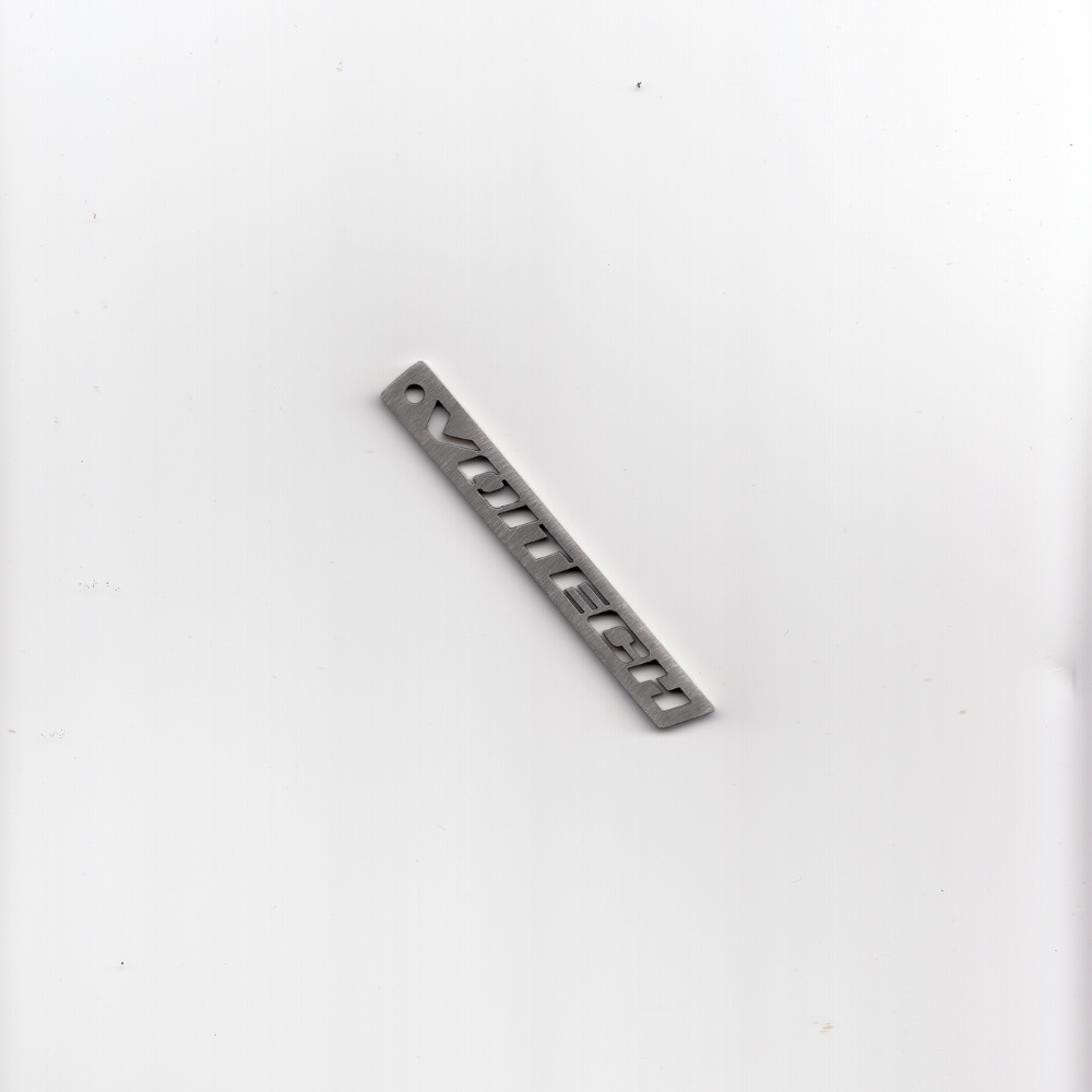 Shop online from our exclusive website and discover the Uplink Tag by Voitech®, featuring brushed stainless steel, precision-cut typography, and a minimalist industrial hardware-inspired design.