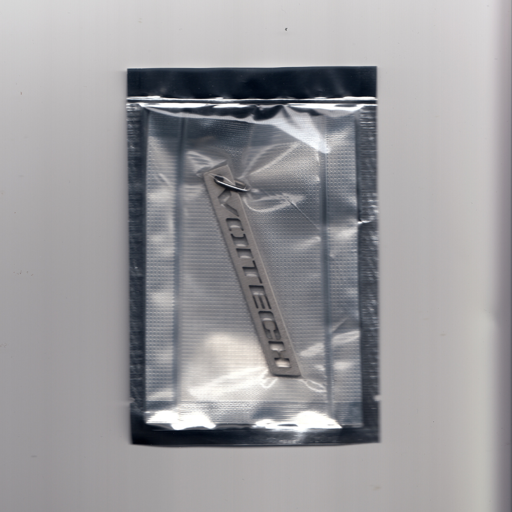 Shop online from our exclusive website and discover the Uplink Tag by Voitech®, featuring brushed stainless steel, precision-cut typography, and a minimalist industrial hardware-inspired design.