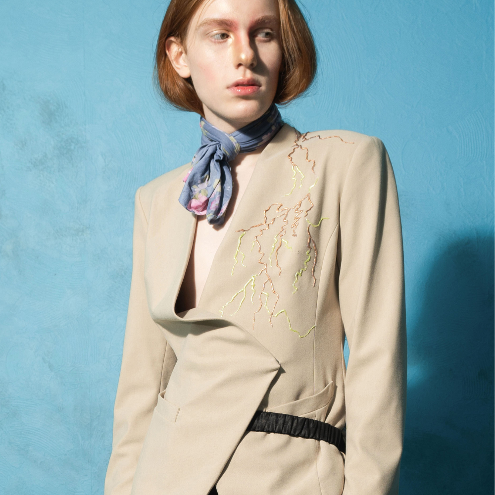 Make a mark in luxury clothing with the Versatile Blazer With Silicone Pattern. Shop Now!