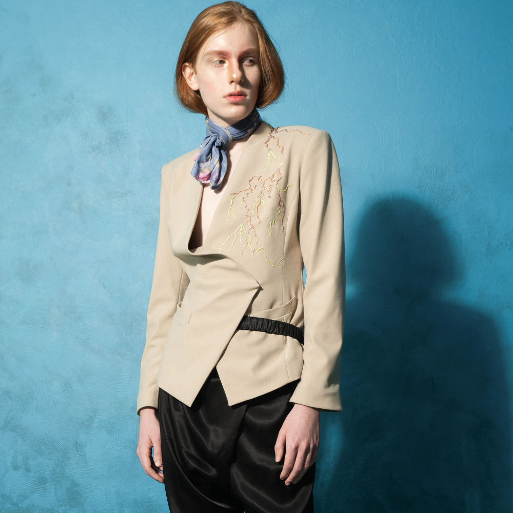 Make a mark in luxury clothing with the Versatile Blazer With Silicone Pattern. Shop Now!