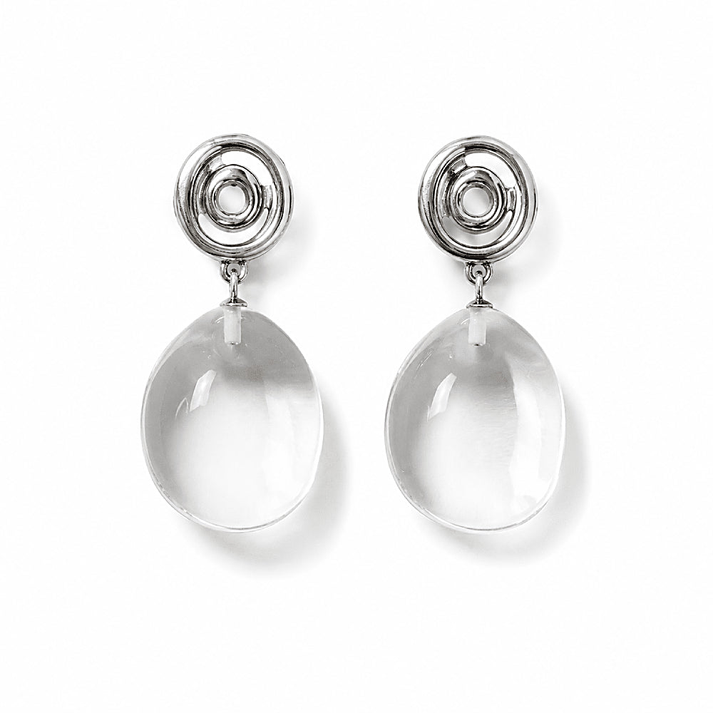 Discover the Vortex Clear Quartz Crystal Spiral Earrings at The Luxe Maison, featuring sculptural spiral studs and luminous clear quartz drops for a modern, elegant look inspired by balance and natural movement.