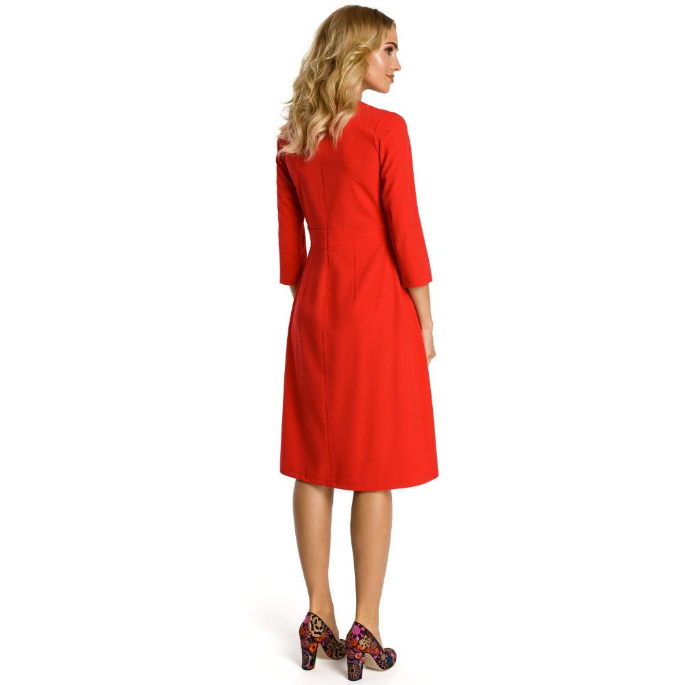 Woven fabric; fit and flare cut; below knee length; front pleats below the waist band; three-quarter sleeves.