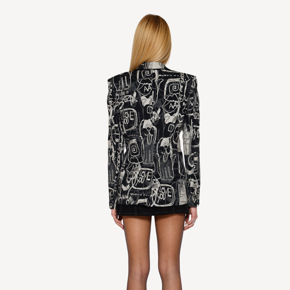 Shop online from our exclusive website. Discover the XO Corset Blazer in a limited-edition XO print, combining corset detailing with a structured blazer silhouette.