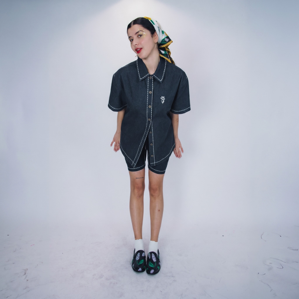 Fun, playful recycled denim shirt in vibrant blue. Designed to turn heads and spark joy. Shop premium styles online.