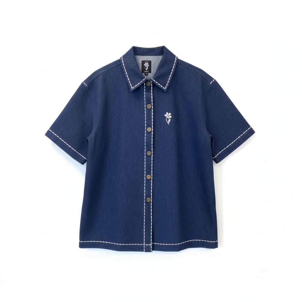 Fun, playful recycled denim shirt in vibrant blue. Designed to turn heads and spark joy. Shop premium styles online.