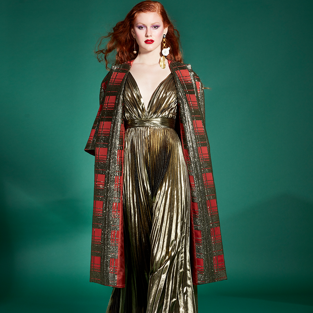 This yolancris piece is a pollet embroidered silk coat that draws a striking copper and dark gold prince of wales print.