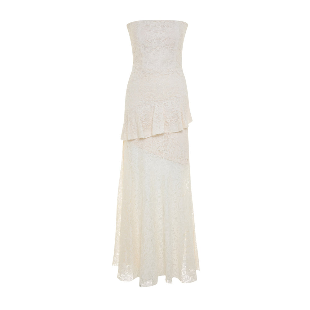 Shop online from our exclusive website and discover the Zephyra Dress by Nana Gotti, a romantic strapless lace dress with a structured bodice and flowing asymmetric layers for timeless elegance.