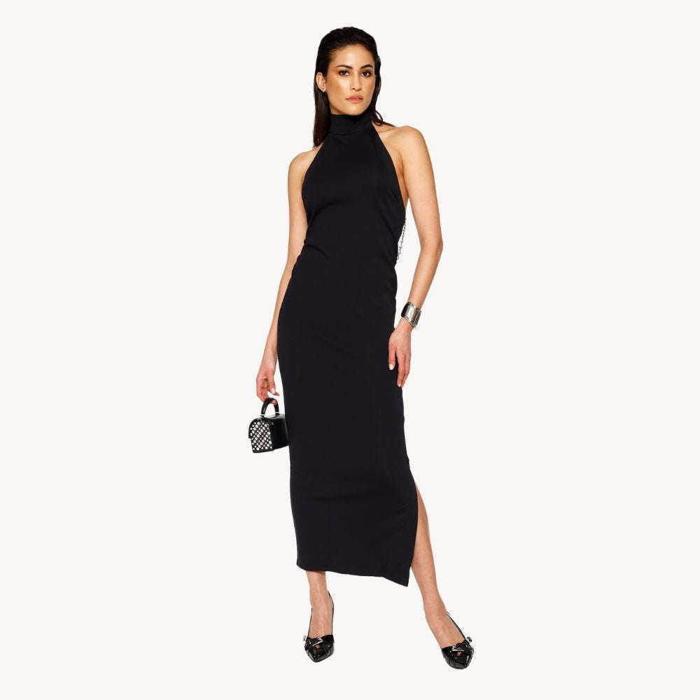 Shop online from our exclusive website. Discover the Zoe Dress, featuring a backless design and side slit for a striking silhouette suited for day or evening wear.