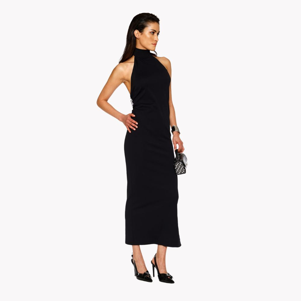 Shop online from our exclusive website. Discover the Zoe Dress, featuring a backless design and side slit for a striking silhouette suited for day or evening wear.