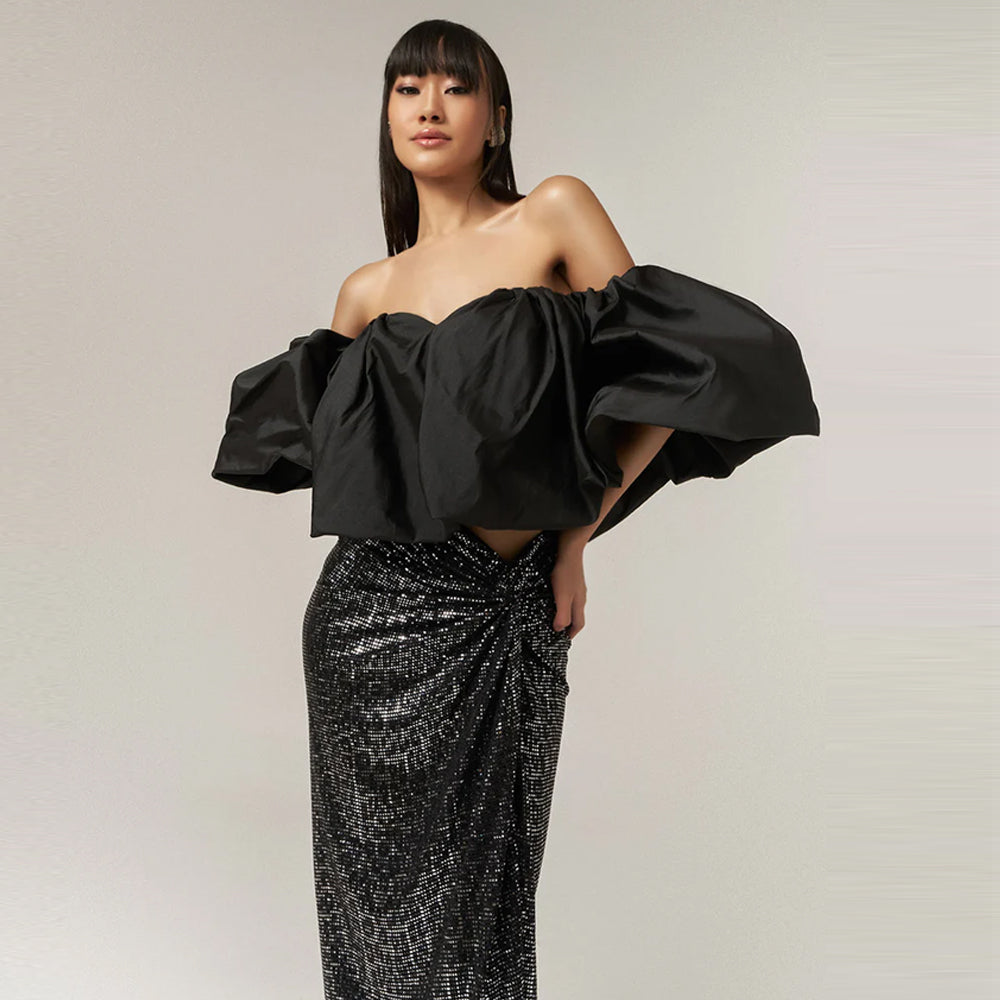 Off shoulder top with sequin skirt, perfect for parties and vacations. Shop online from our curated edit of premium fashion.